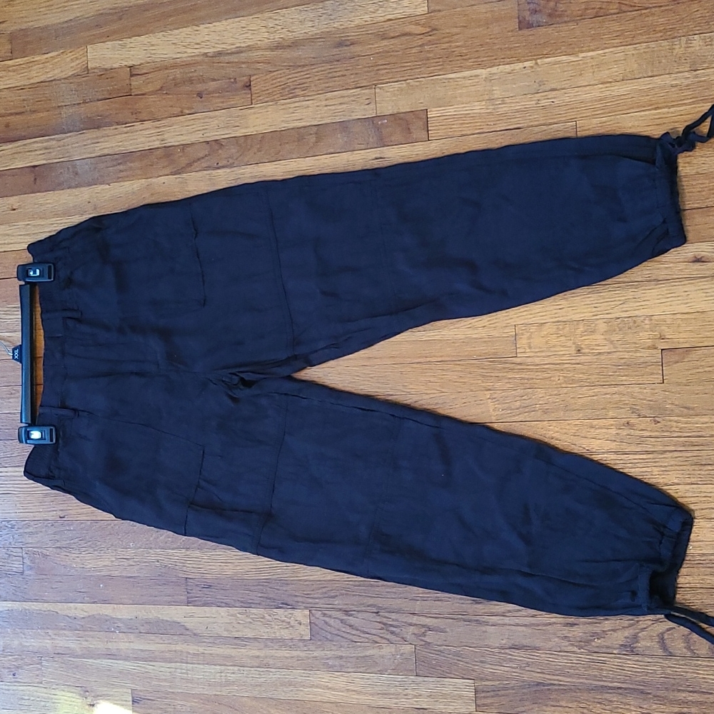 Anthropologie Black Pants with black flowers design
